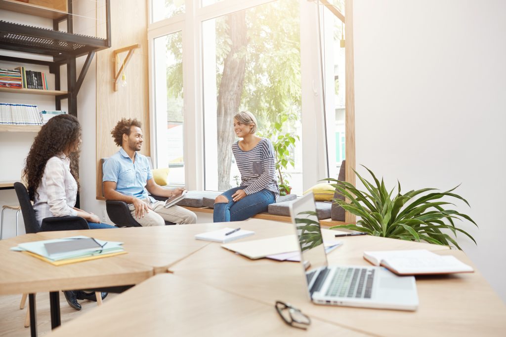 Brick Marketing consultants talking through a client's AI search questions